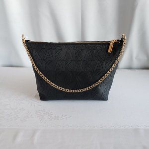 ANNE KLEIN Initial Black faux leather, gold chain strap hand bag